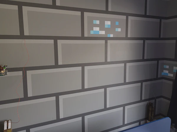 Wires sticking out the wall. BTW, you can’t buy this Minecraft pattern. It’s paint! Layer upon layer of hard slog! Looks brilliant though IMHO.